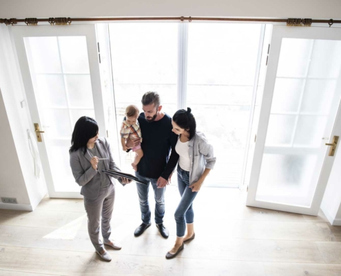 Realtor showing family a home